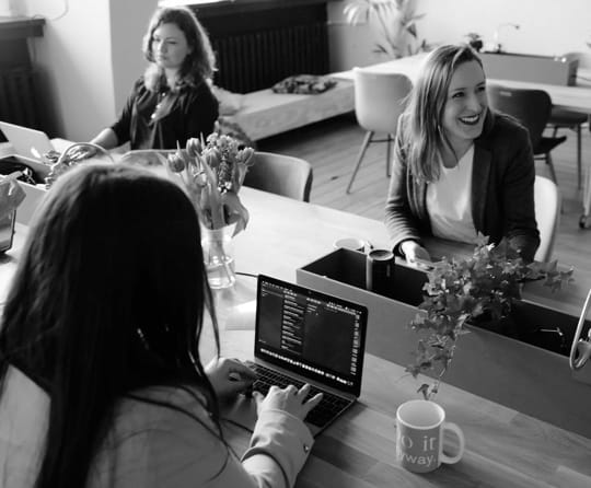 image of a smiling woman in a office